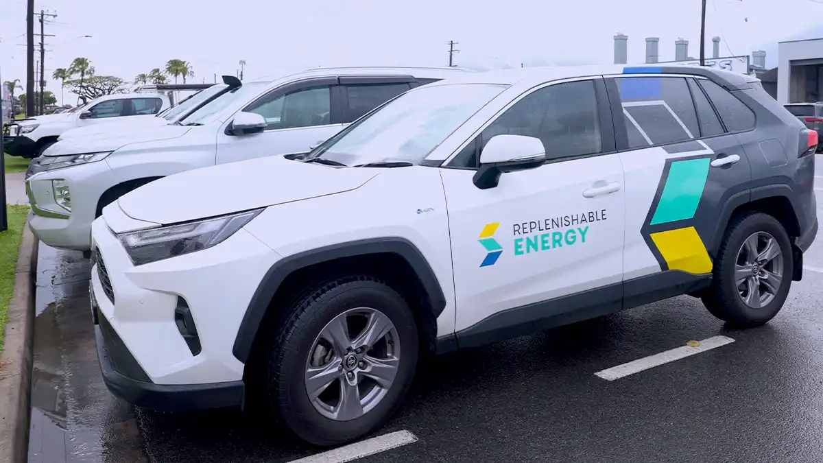 White Replenishable Energy branded SUV parked in Cairns